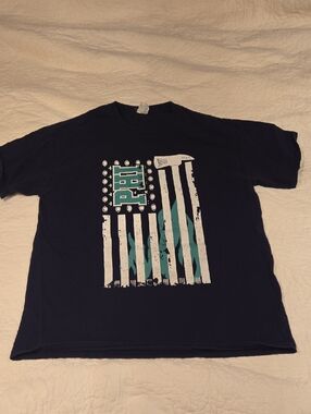 Graphic EAGLES FOOTBALL FIREFIGHTER Flag Tee with Teal Accent SIZE L